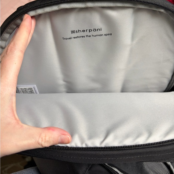 Sherpani Black Backpack with Orange and Blue Accents - Picture 4 of 8